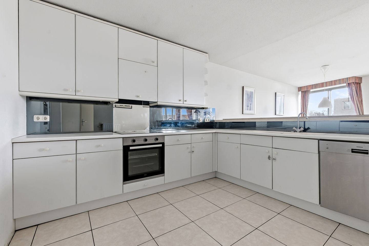 Foto 14 van Raadhuisstraat 34