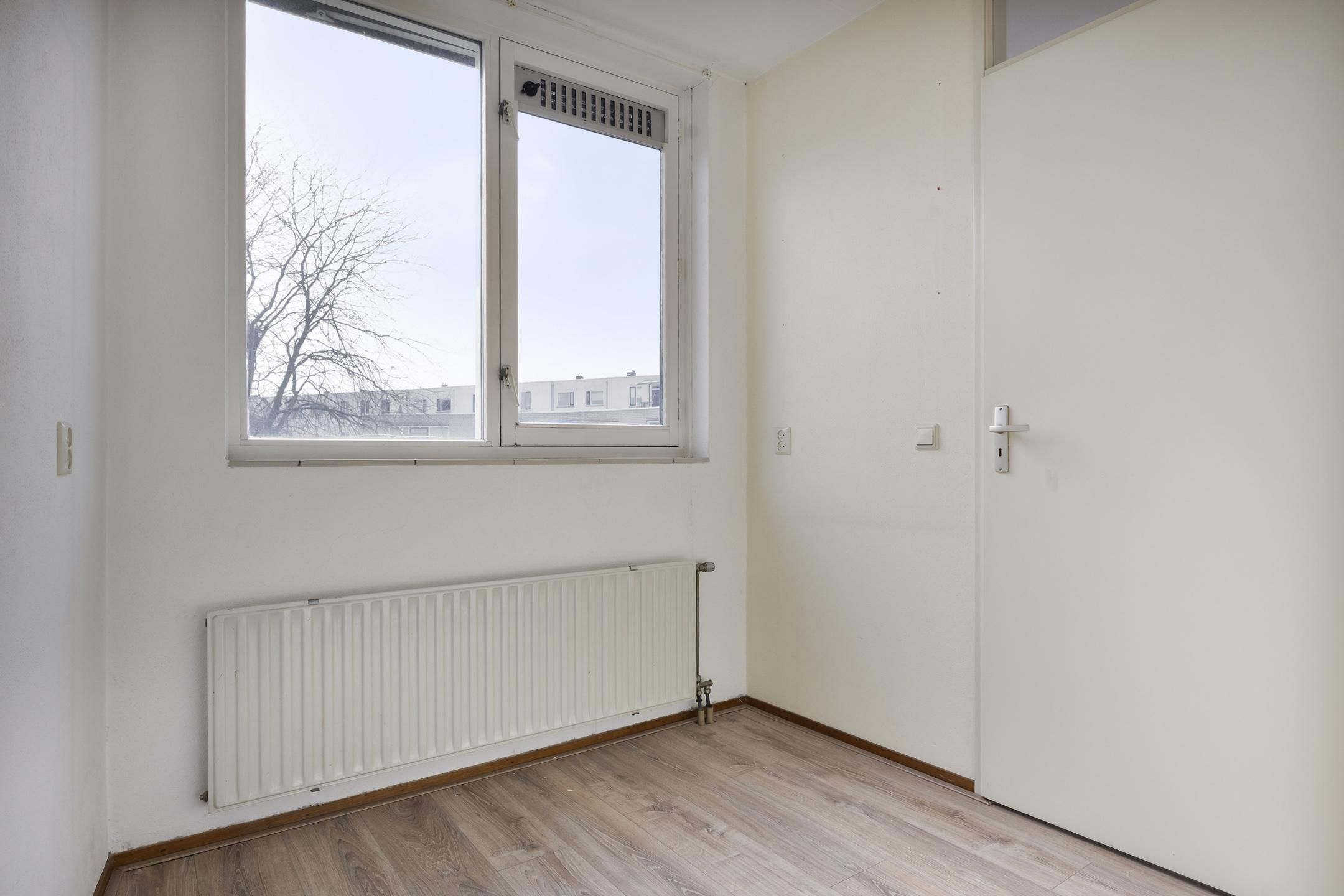 Foto 27 van Sleutelring 19