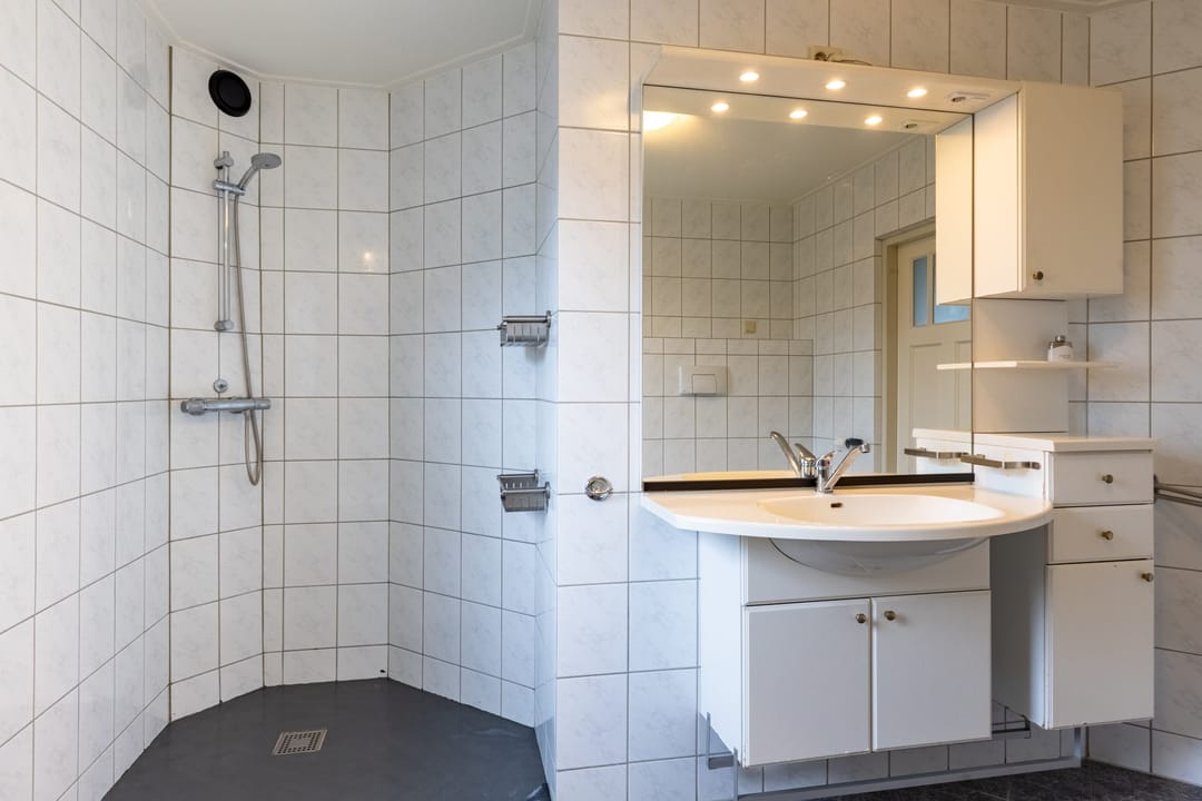 Spacious Detached Business Residence with Office Spaces and Sustainable Energy Features — 24