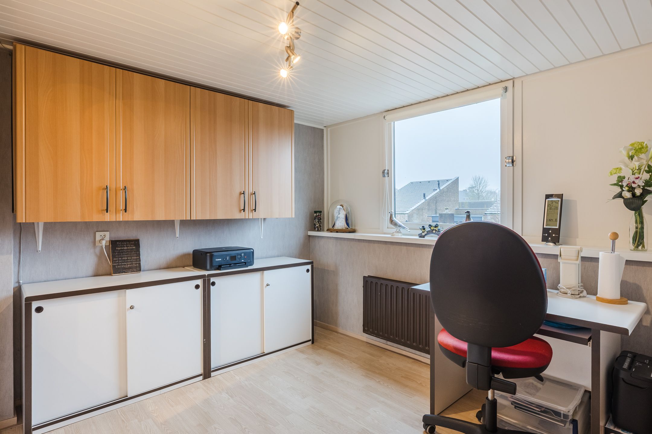 Semi-detached house with deep south-facing backyard, garage and carport in Gilze village center — 24