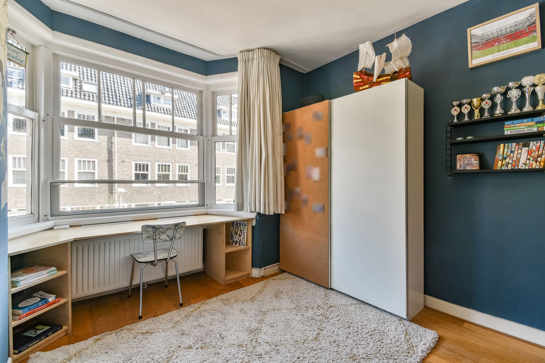 Foto 24 van Woubruggestraat 22-H