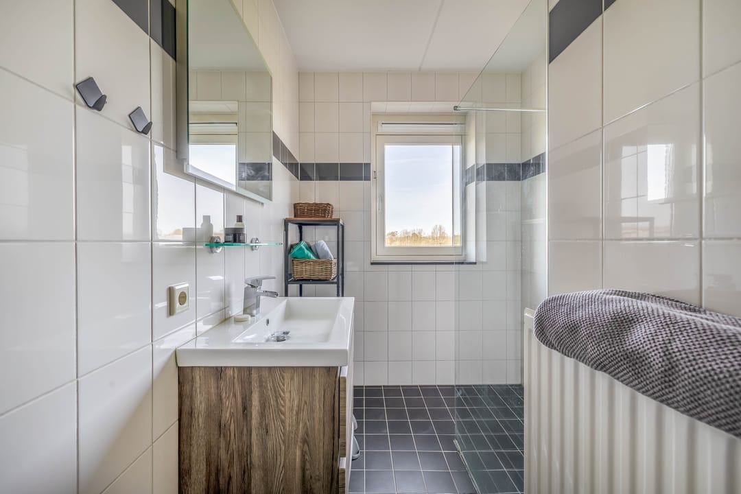 Foto 26 van Weegbree 34