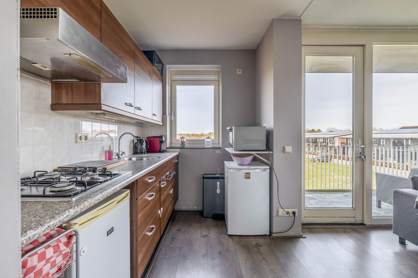 Foto 14 van Weegbree 34