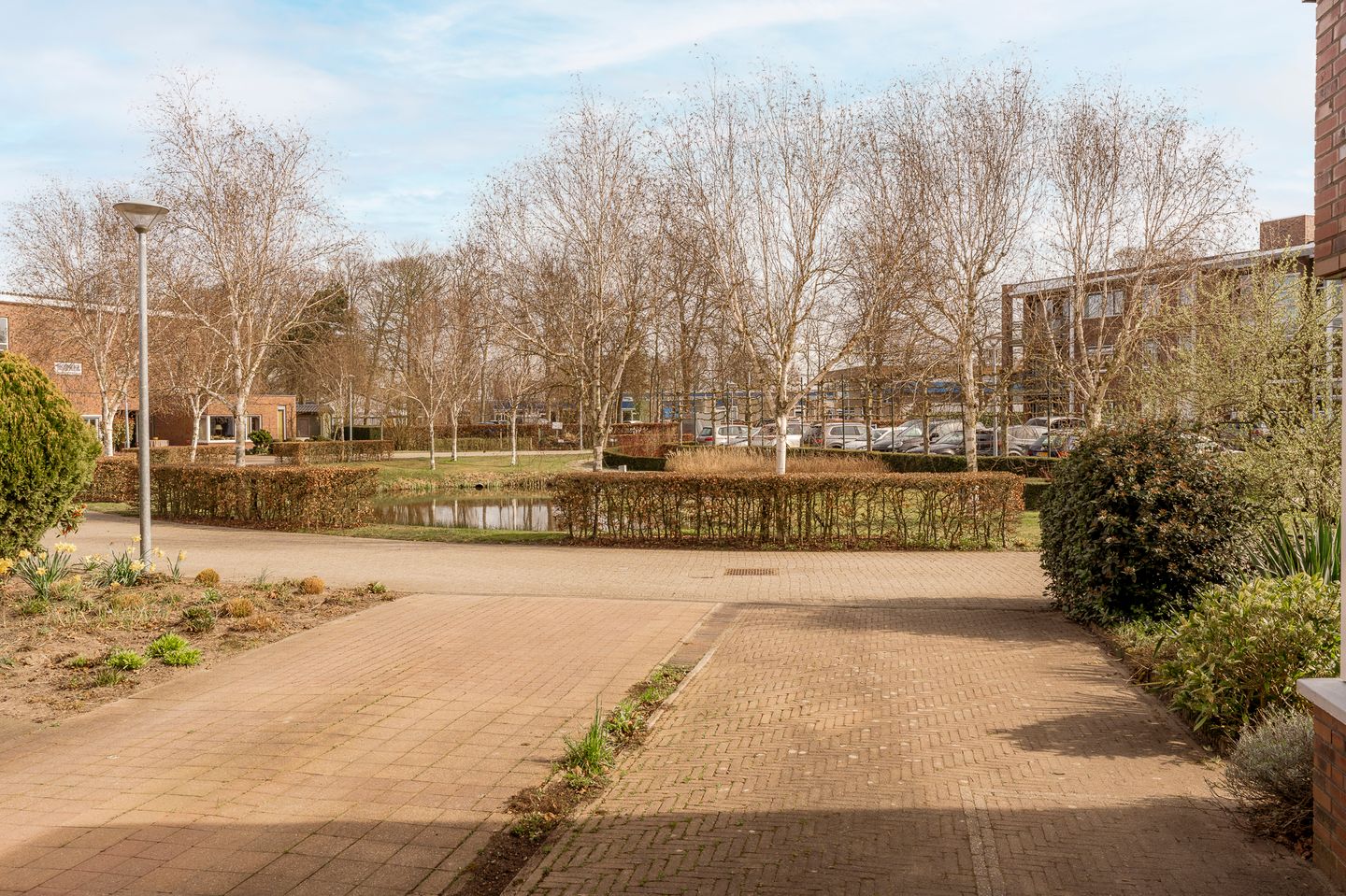 Semi-detached 55+ residence with garage and sunny garden in green park setting — 34