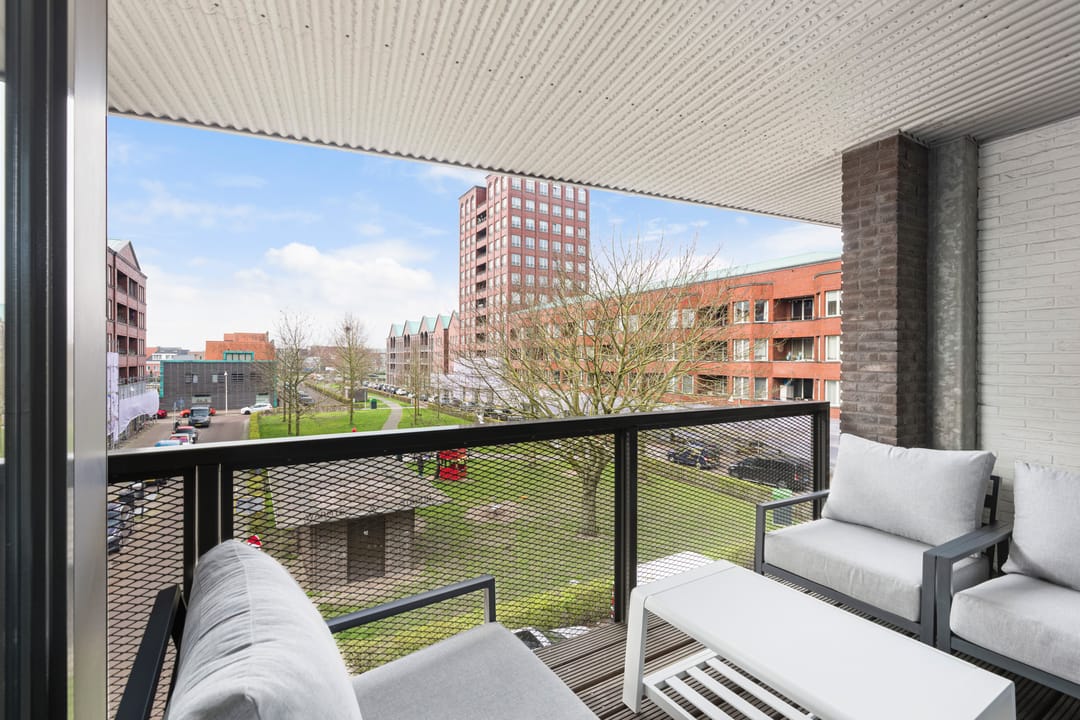 Modern corner apartment with free view and sunny southwest balcony — 21