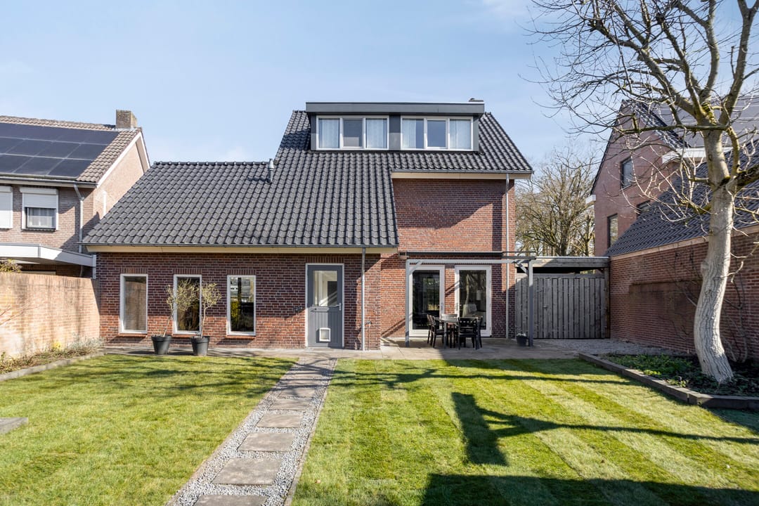 Modern detached home with generous living space and exceptional parking facilities — 16