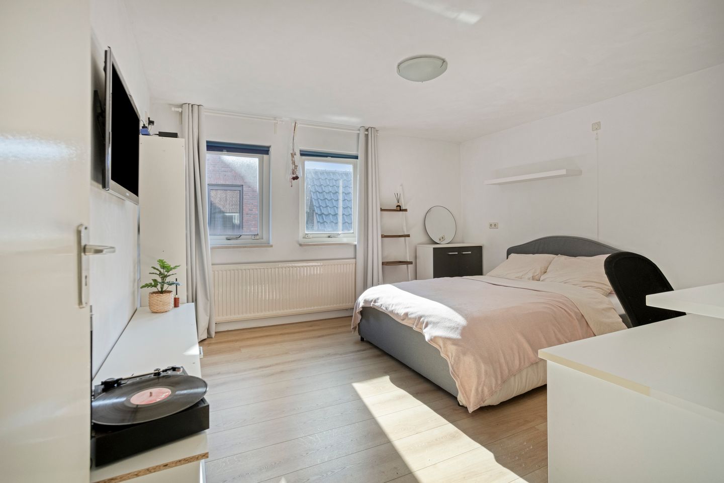 Modern detached home with generous living space and exceptional parking facilities — 20