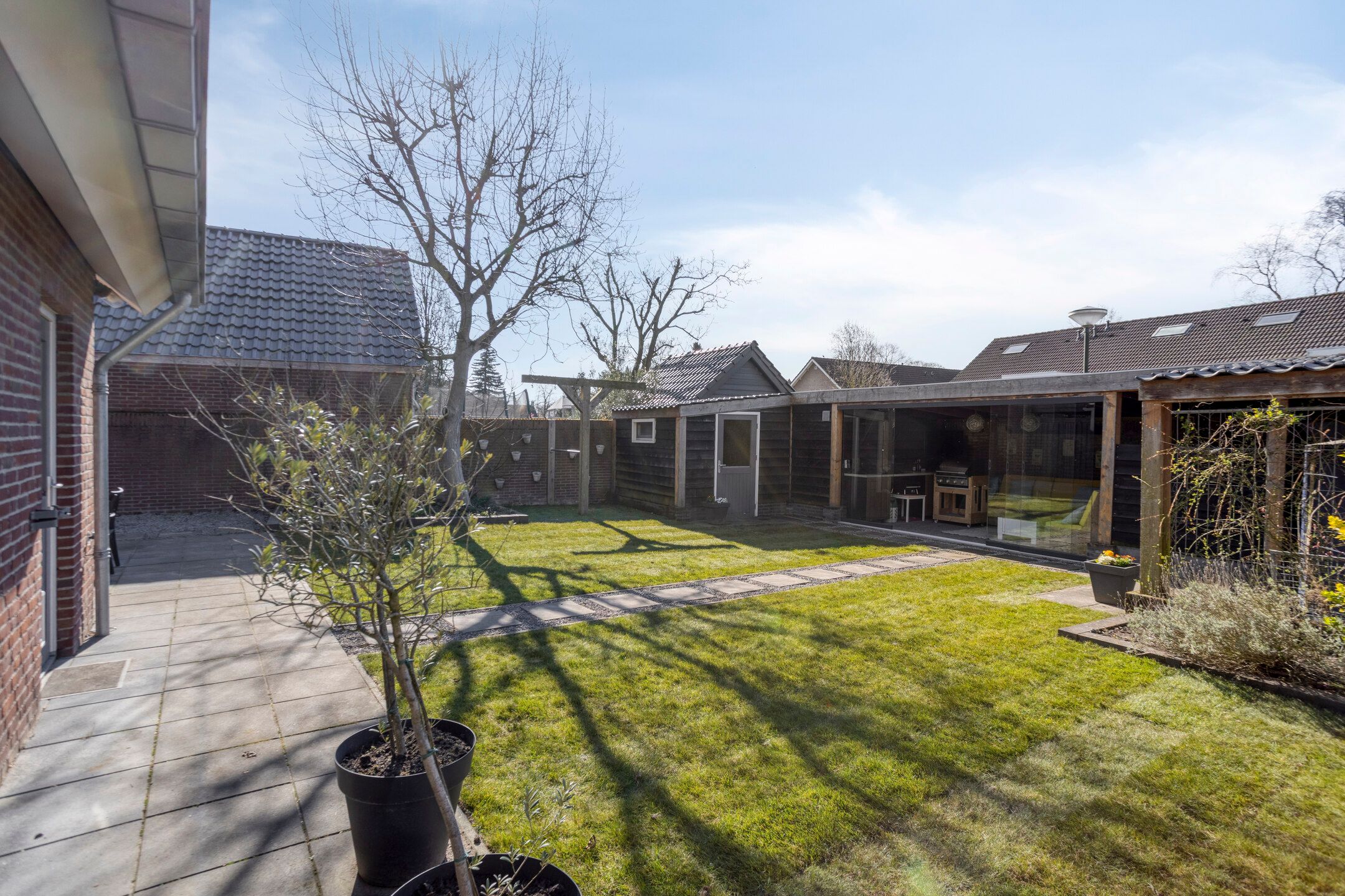 Modern detached home with generous living space and exceptional parking facilities — 15