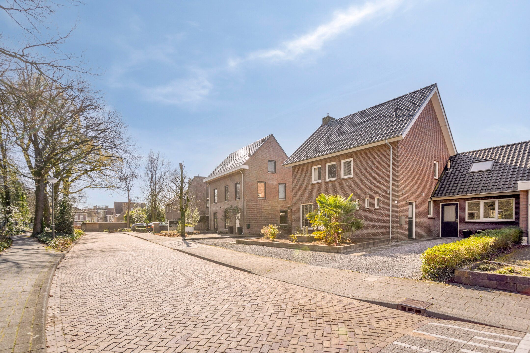 Modern detached home with generous living space and exceptional parking facilities — 36