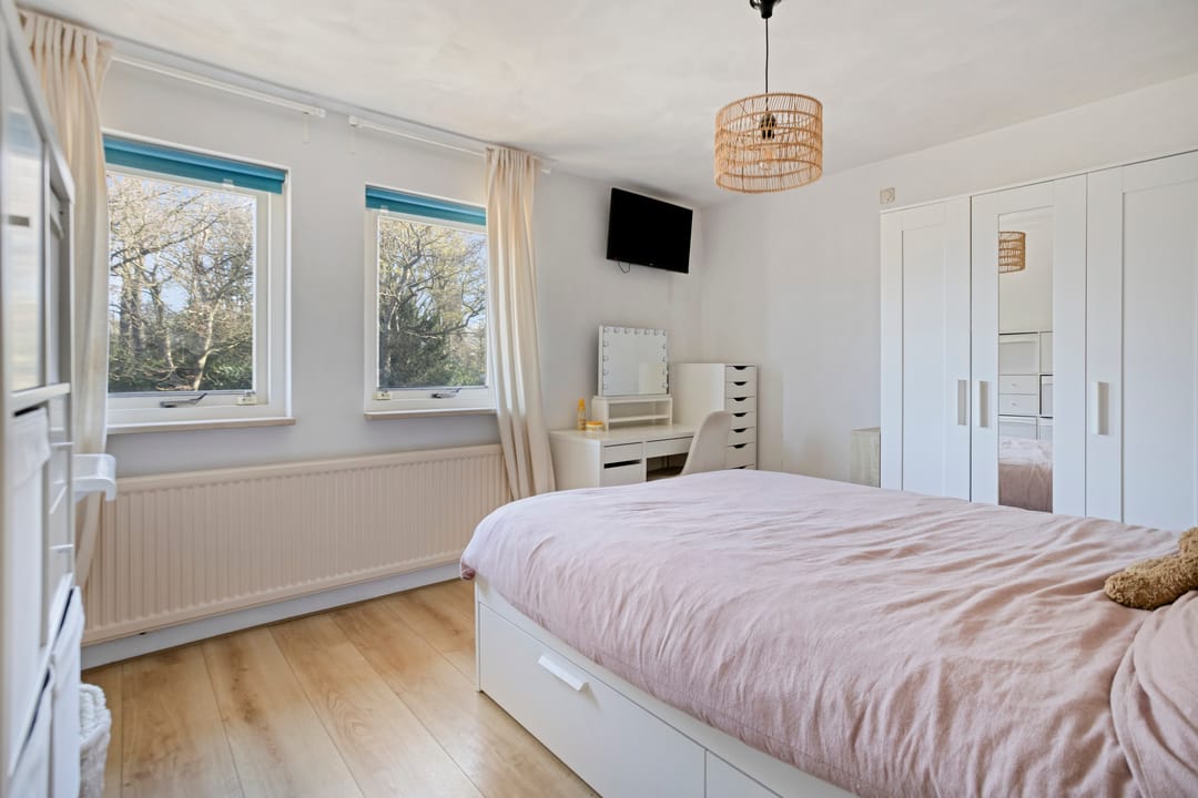 Modern detached home with generous living space and exceptional parking facilities — 22