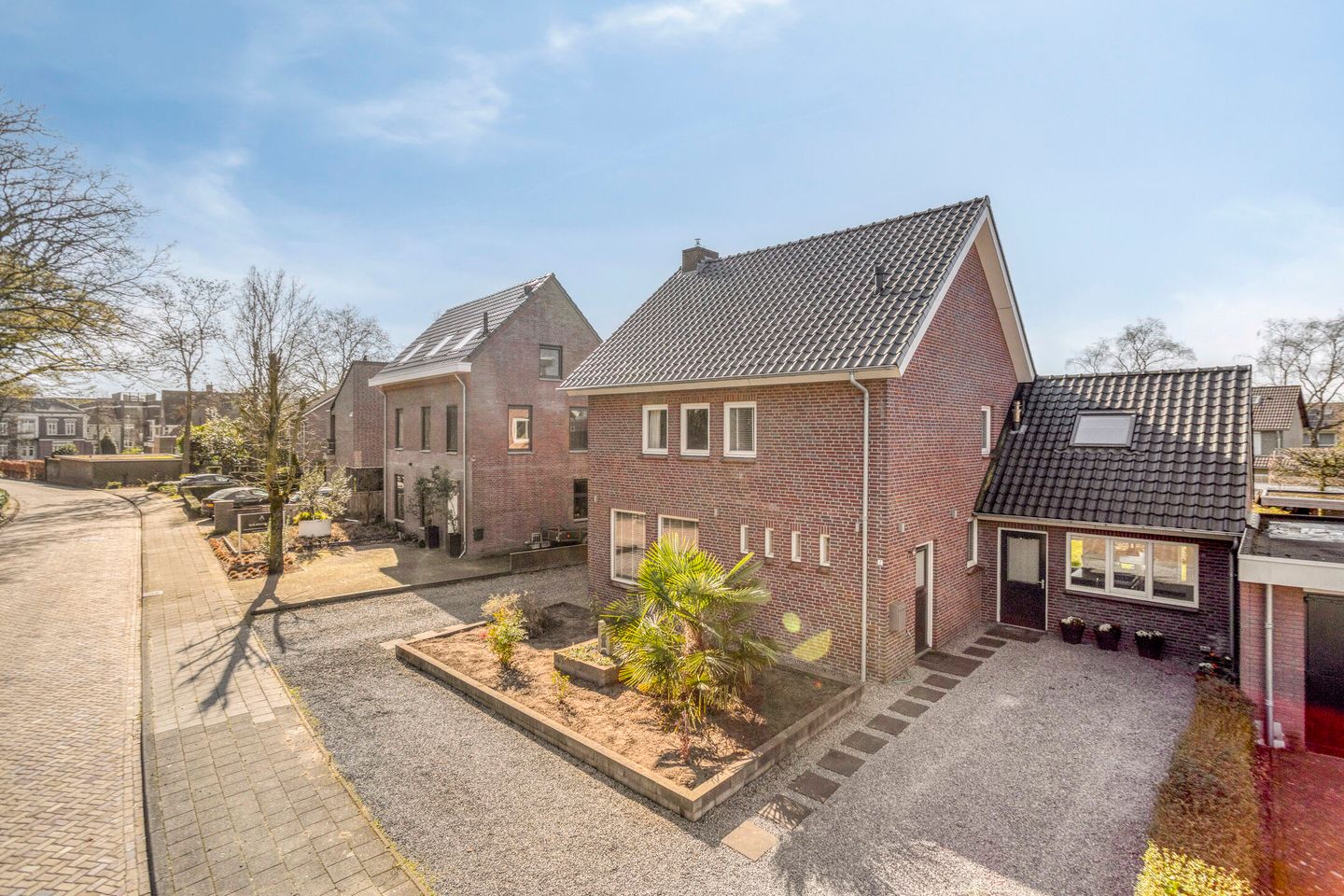 Modern detached home with generous living space and exceptional parking facilities — 35