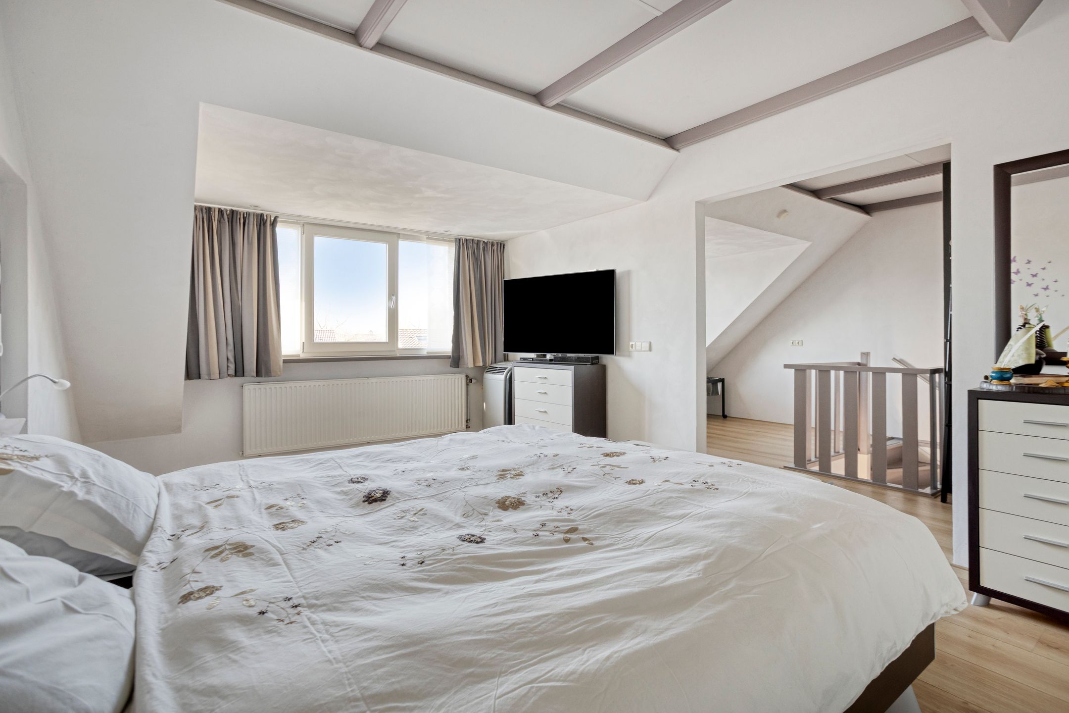 Modern detached home with generous living space and exceptional parking facilities — 30