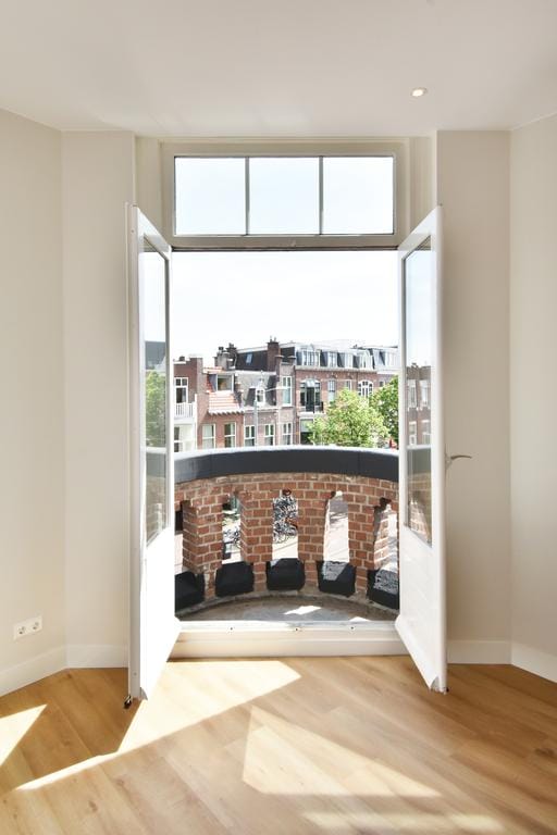 Foto 14 van Van Beuningenstraat 49-A