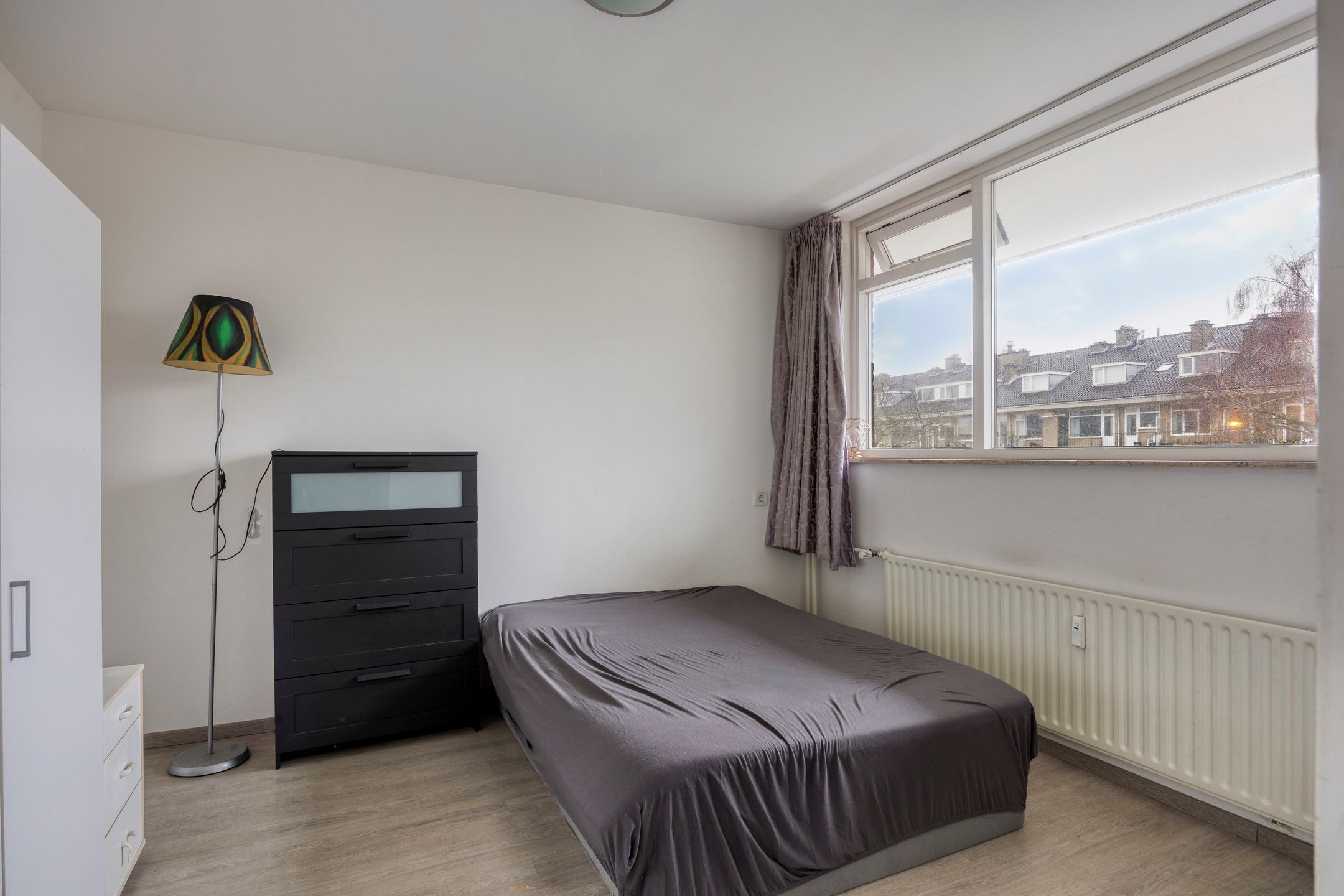 Move-in ready 1-bedroom apartment with balcony and storage in green residential area — 21