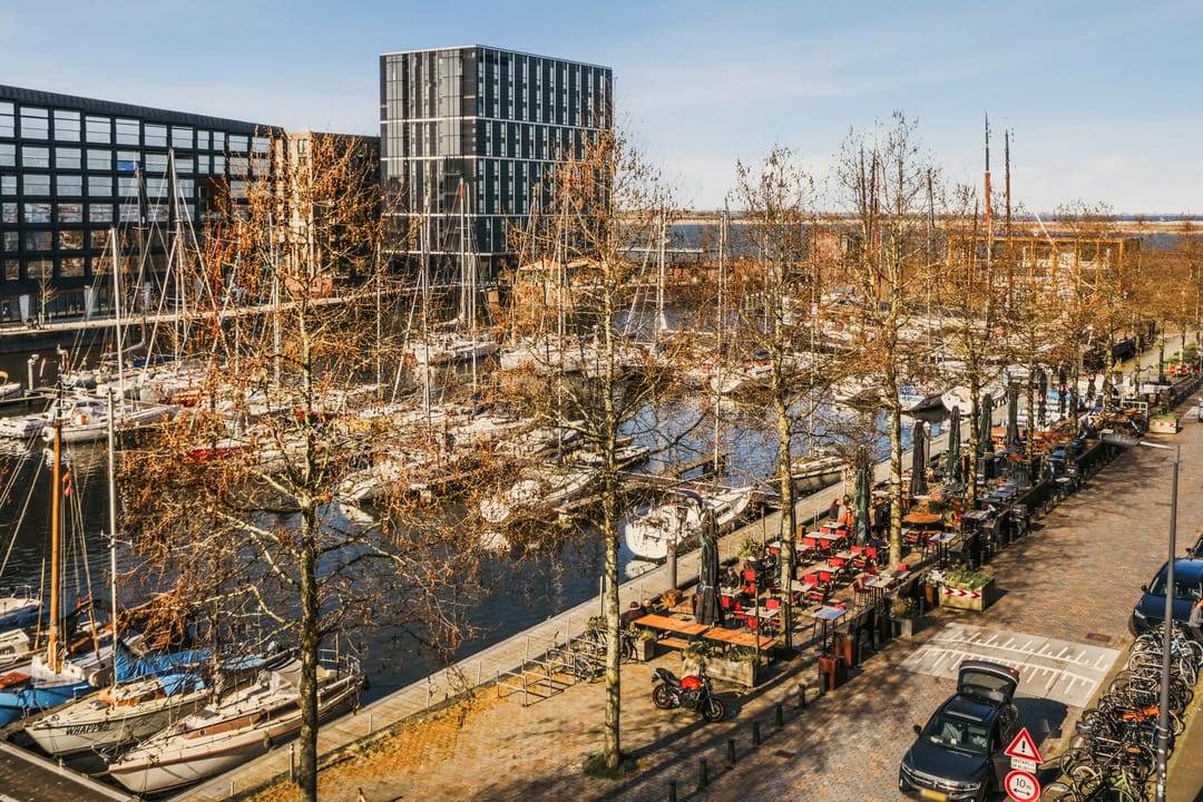 Spacious corner apartment with harbor views in IJburg — 13