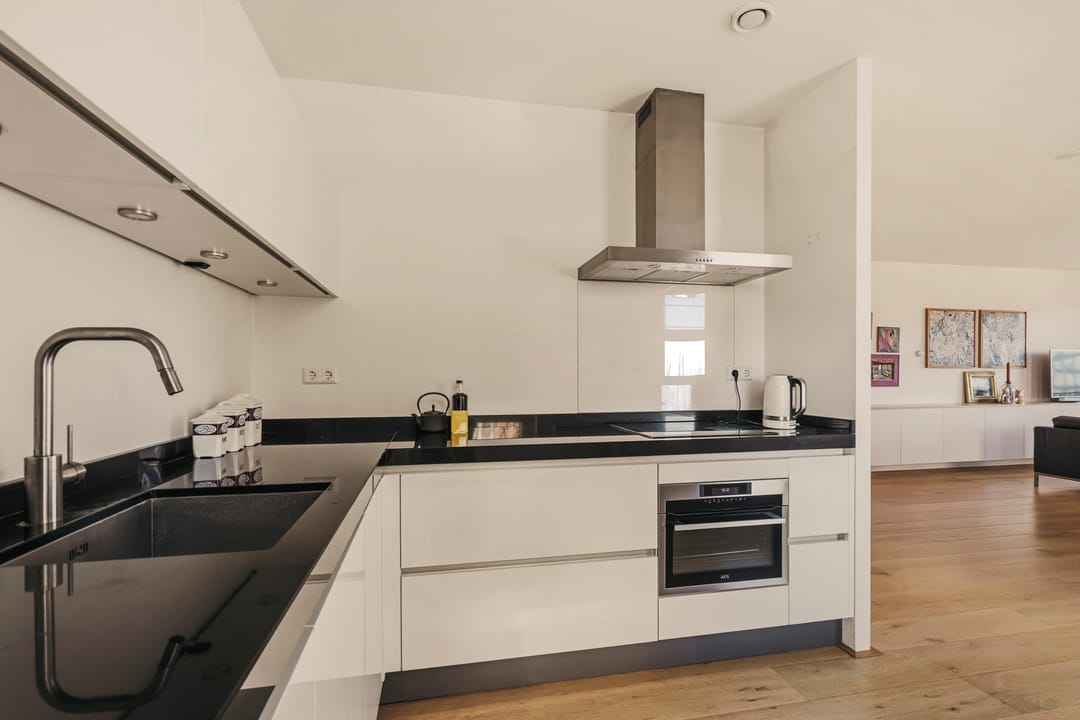 Spacious corner apartment with harbor views in IJburg — 26