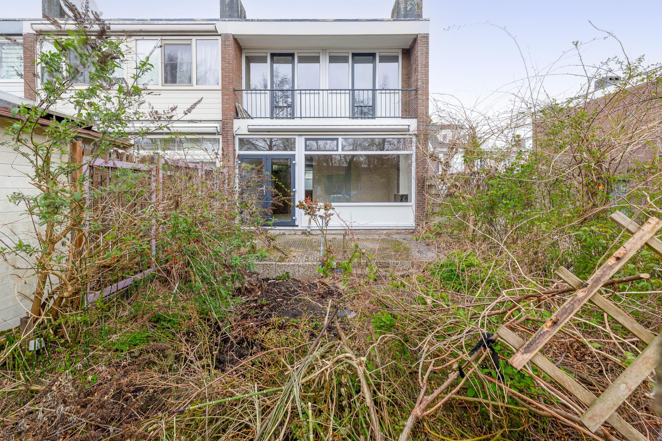 Renovation opportunity corner home with sunny south-facing garden — 32