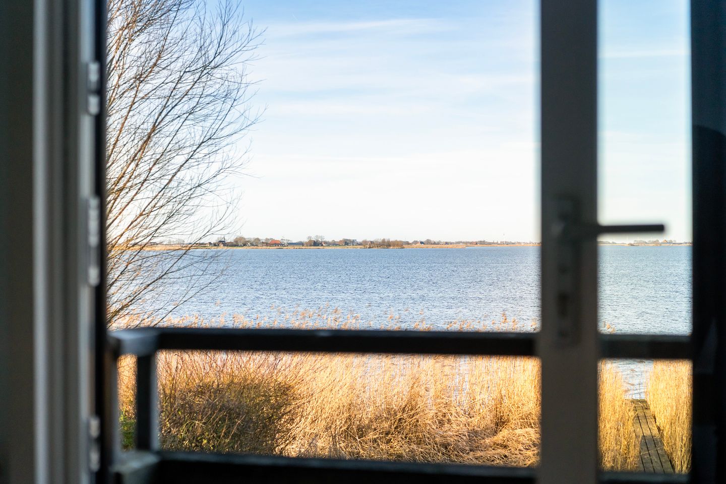 Waterfront Living with Panoramic Lake Views in Friesland — 33