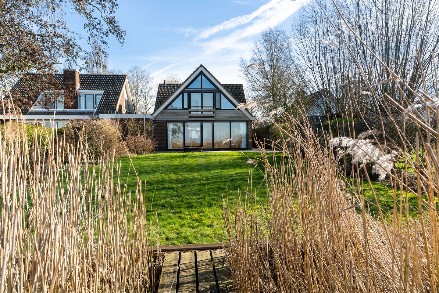 Waterfront Living with Panoramic Lake Views in Friesland — 37
