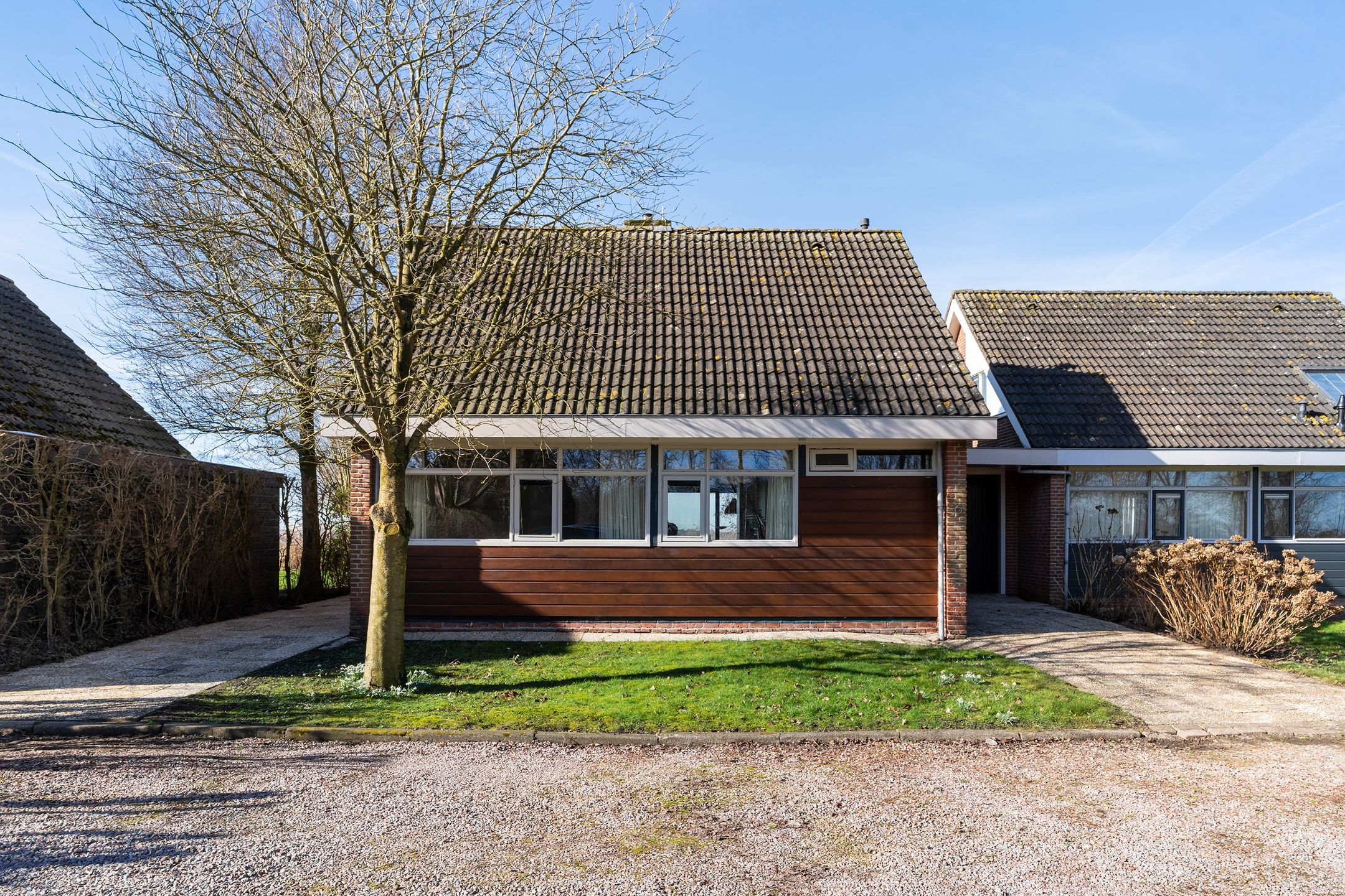 Waterfront Living with Panoramic Lake Views in Friesland — 48