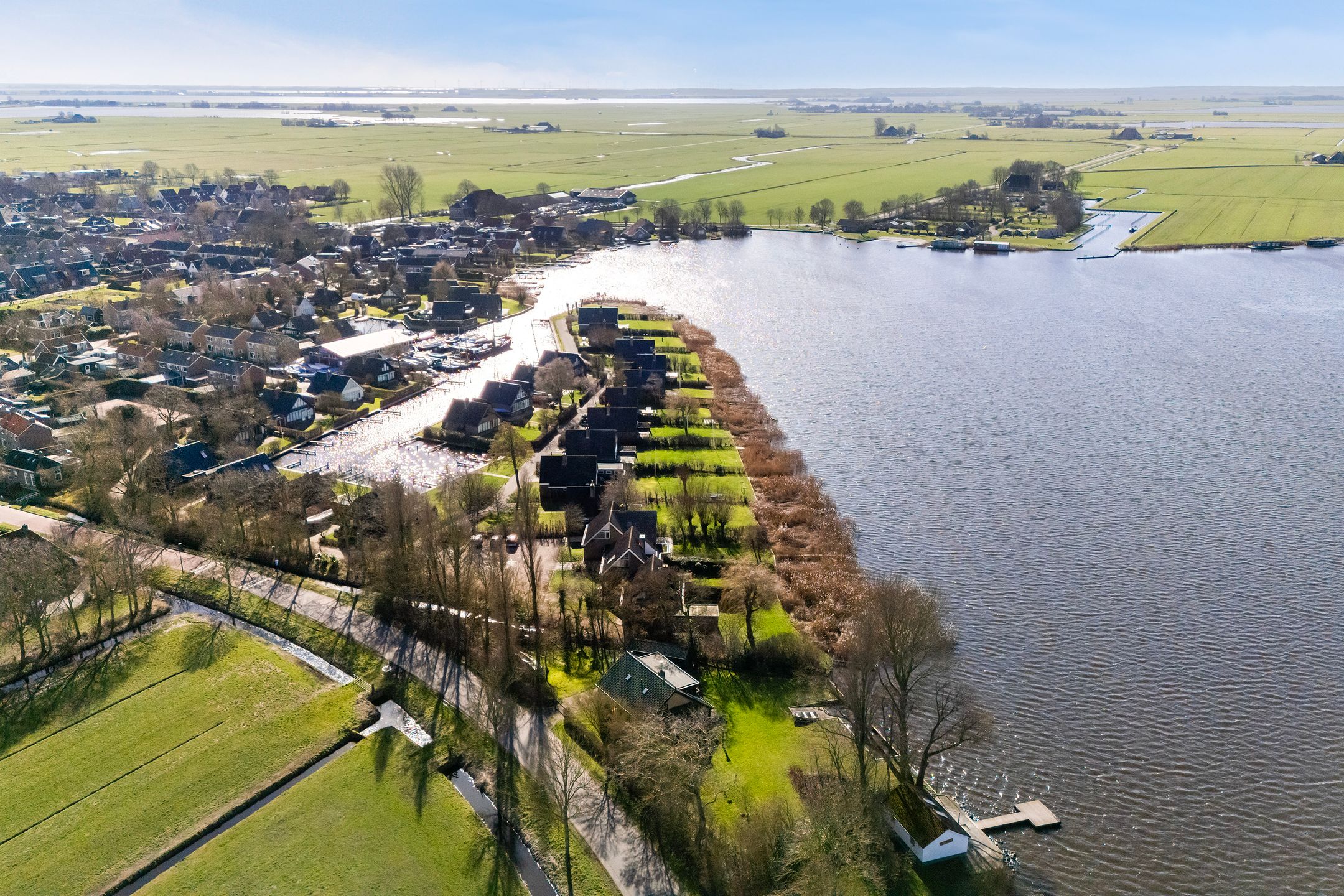 Waterfront Living with Panoramic Lake Views in Friesland — 54