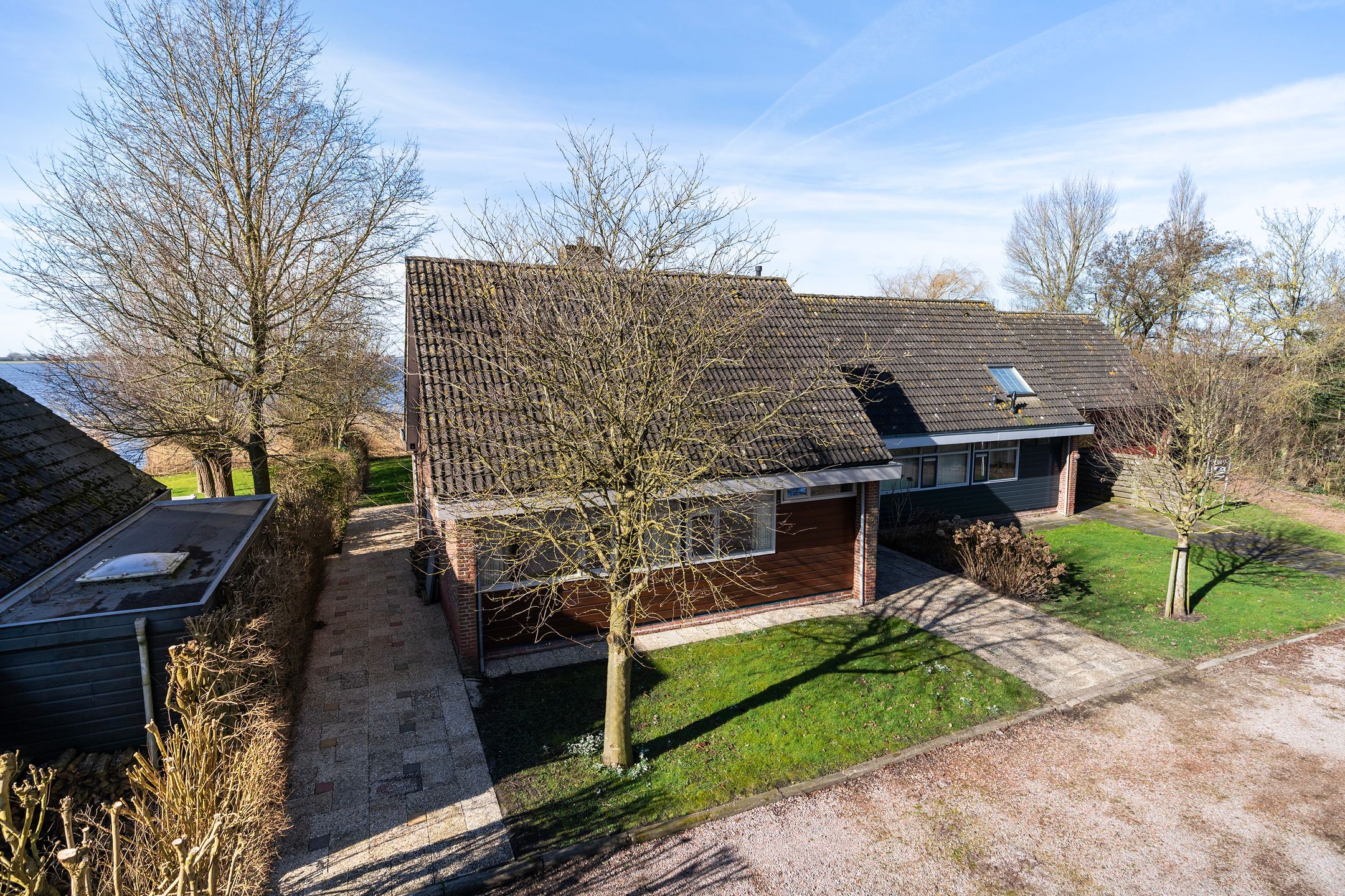 Waterfront Living with Panoramic Lake Views in Friesland — 45