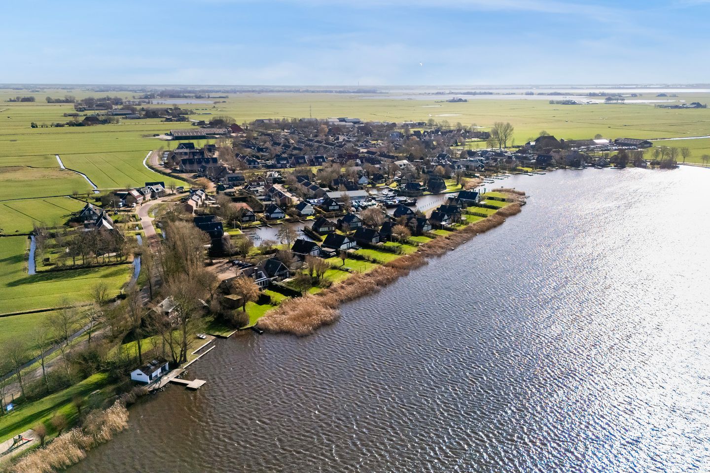 Waterfront Living with Panoramic Lake Views in Friesland — 56