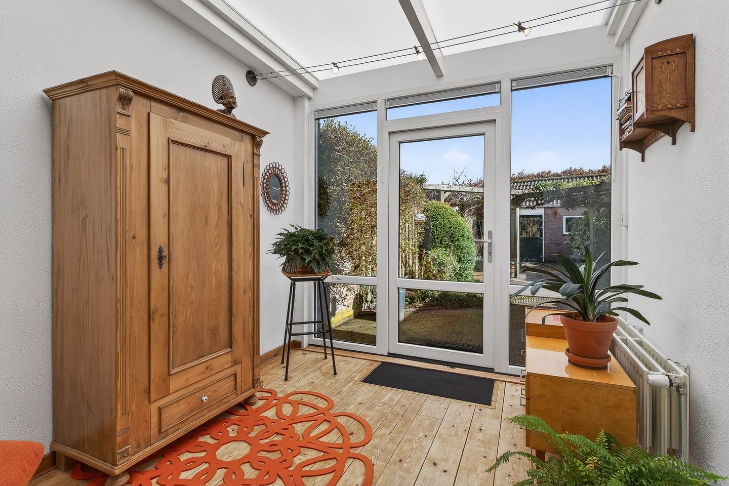 Spacious and Bright Family Home with Sunroom in Quiet Schijndel Neighborhood — 18
