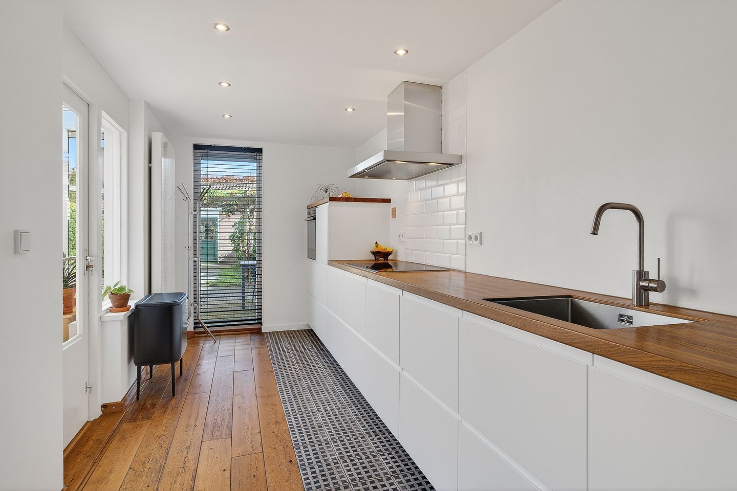 Spacious and Bright Family Home with Sunroom in Quiet Schijndel Neighborhood — 13