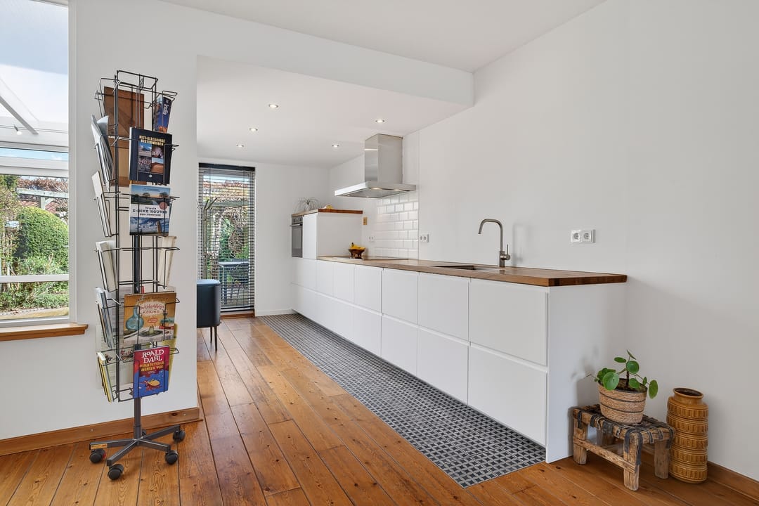Spacious and Bright Family Home with Sunroom in Quiet Schijndel Neighborhood — 12