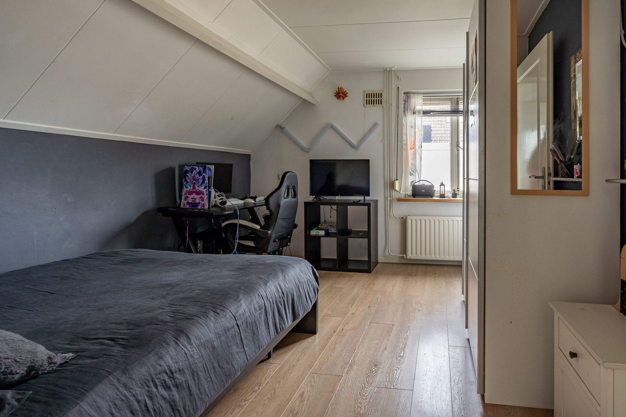 Foto 24 van J.E.S. Holthausstraat 1