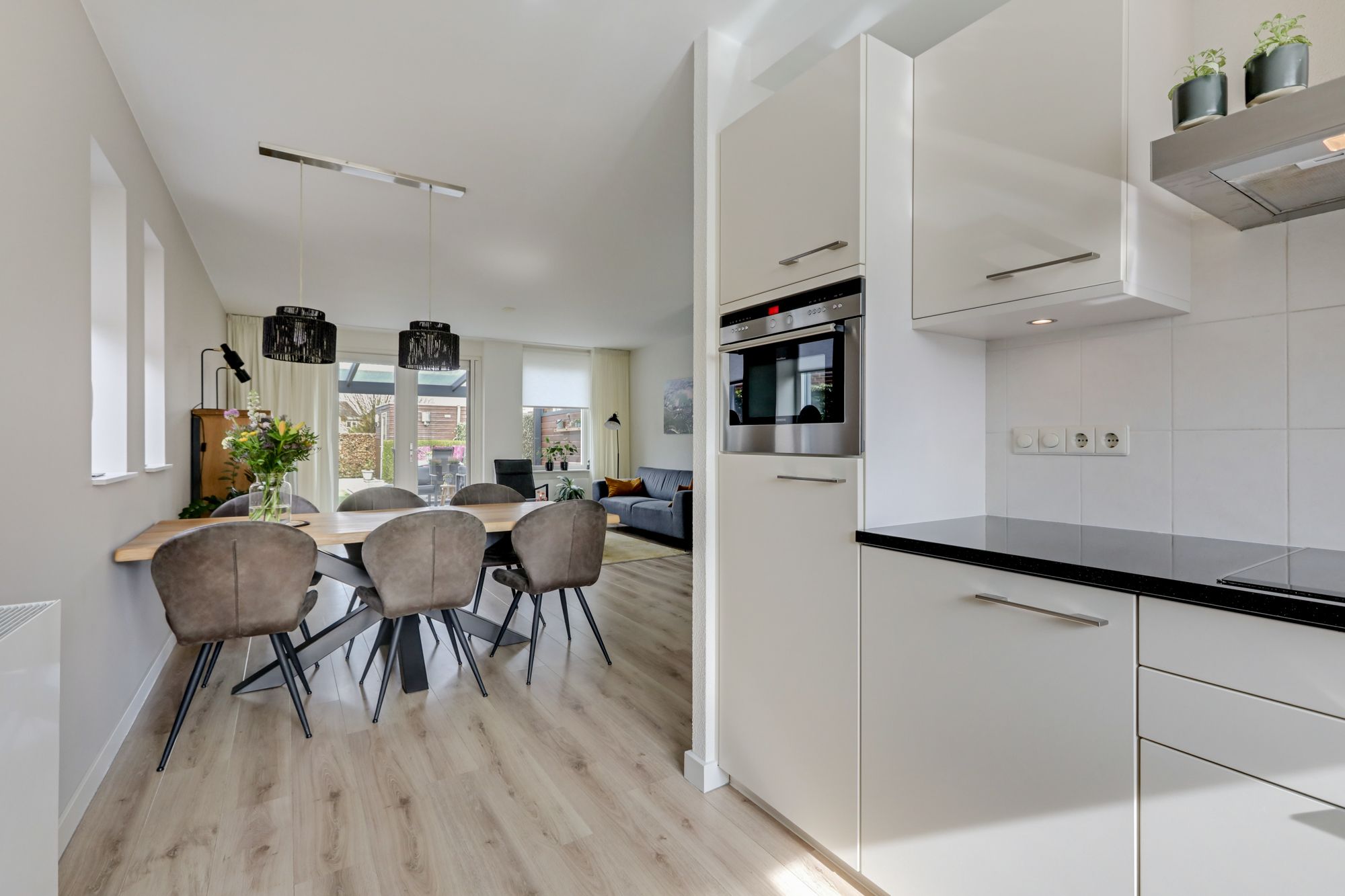 Energy-efficient corner home with enclosed veranda in Loo — 16
