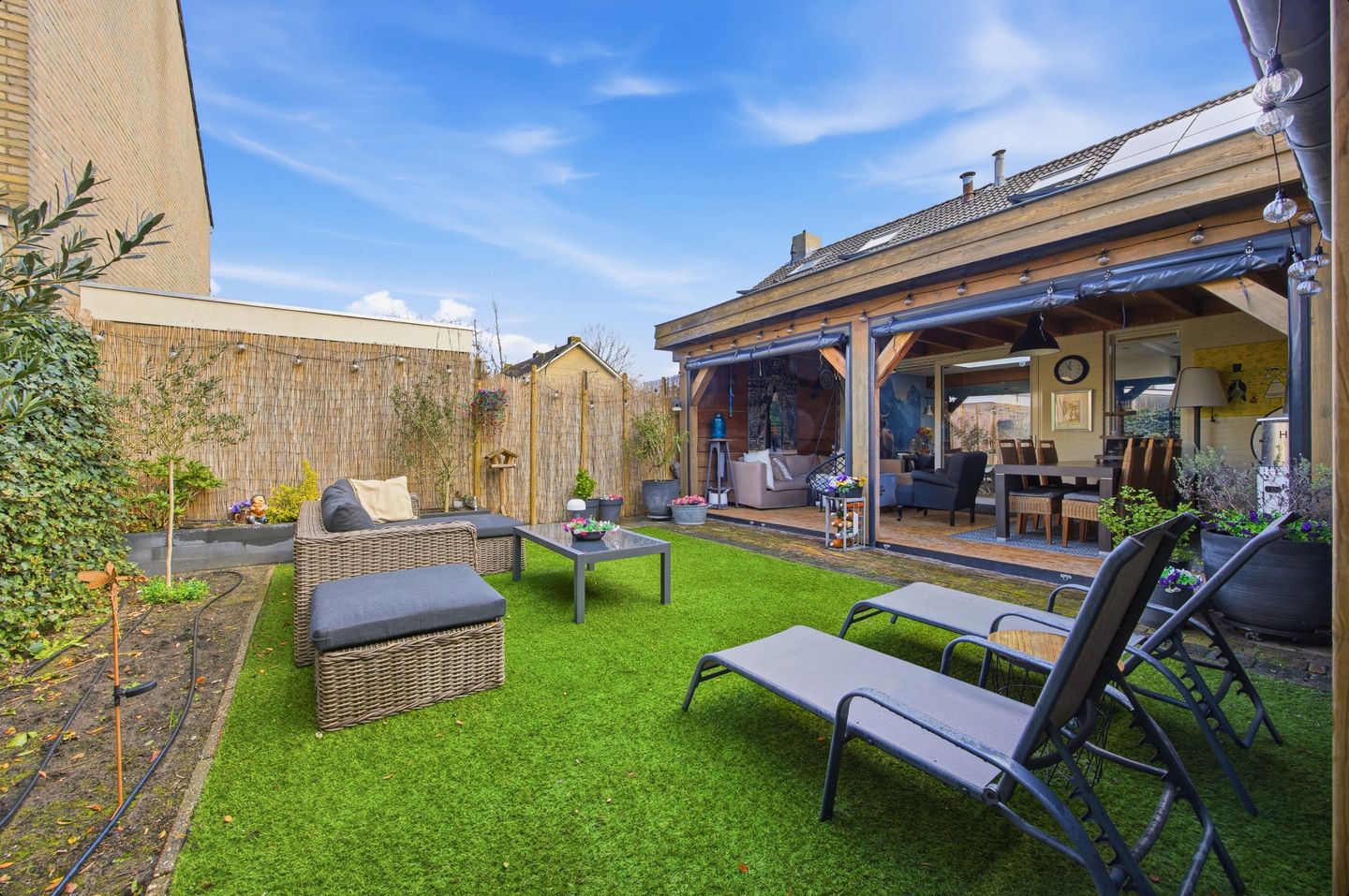 Spacious and sustainably renovated semi-detached home with modern finishes and garden extensions — 43