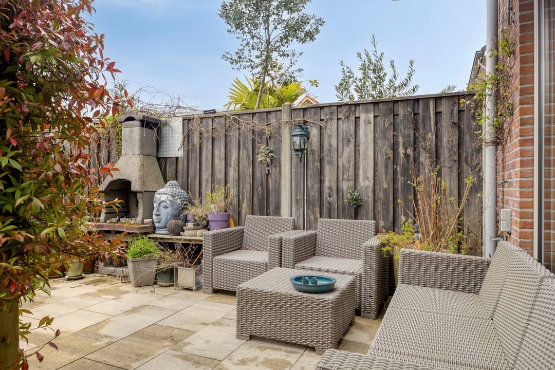 Spacious terraced home with sunny southwest garden in quiet Leiden neighborhood — 17
