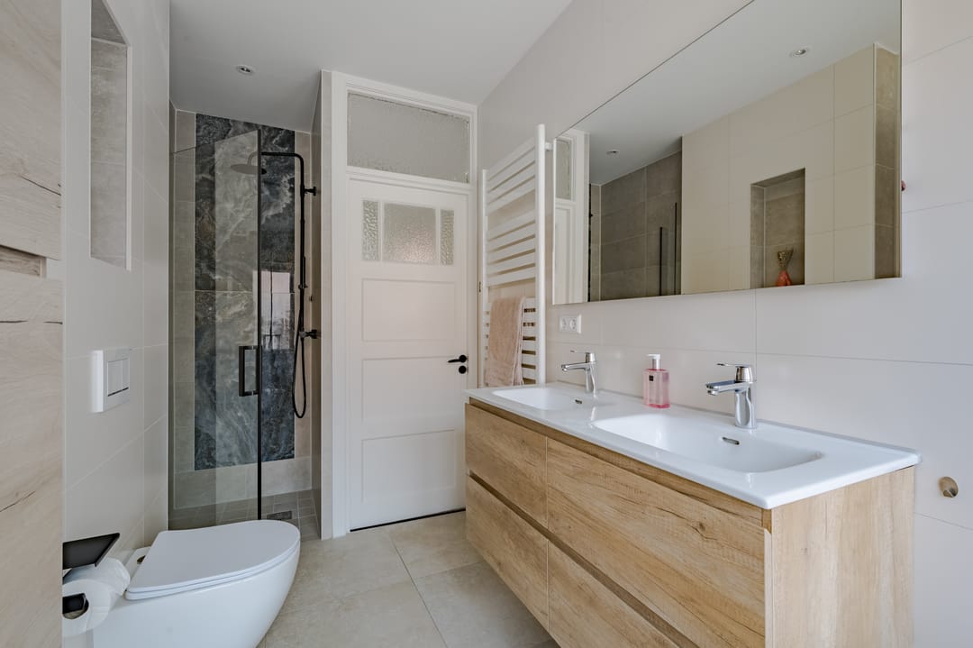 Move-In Ready 1930s Corner House with Garage and Stunning Natural Light — 32