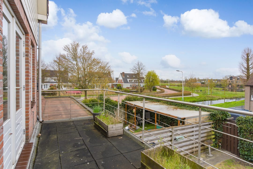 Foto 23 van Haarmos 10