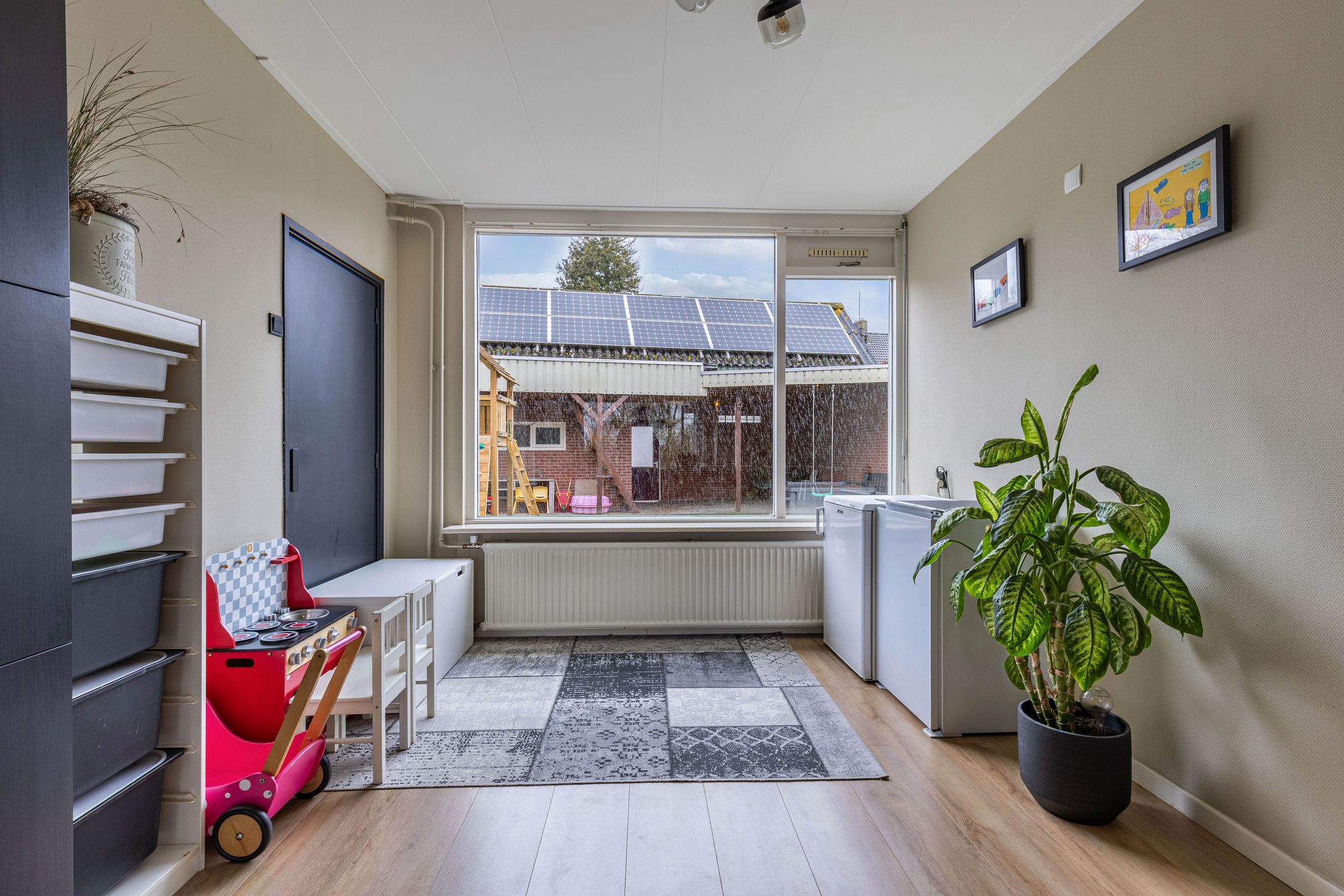 Spacious corner house with 4 bedrooms, carport and extended living area near village centre — 15