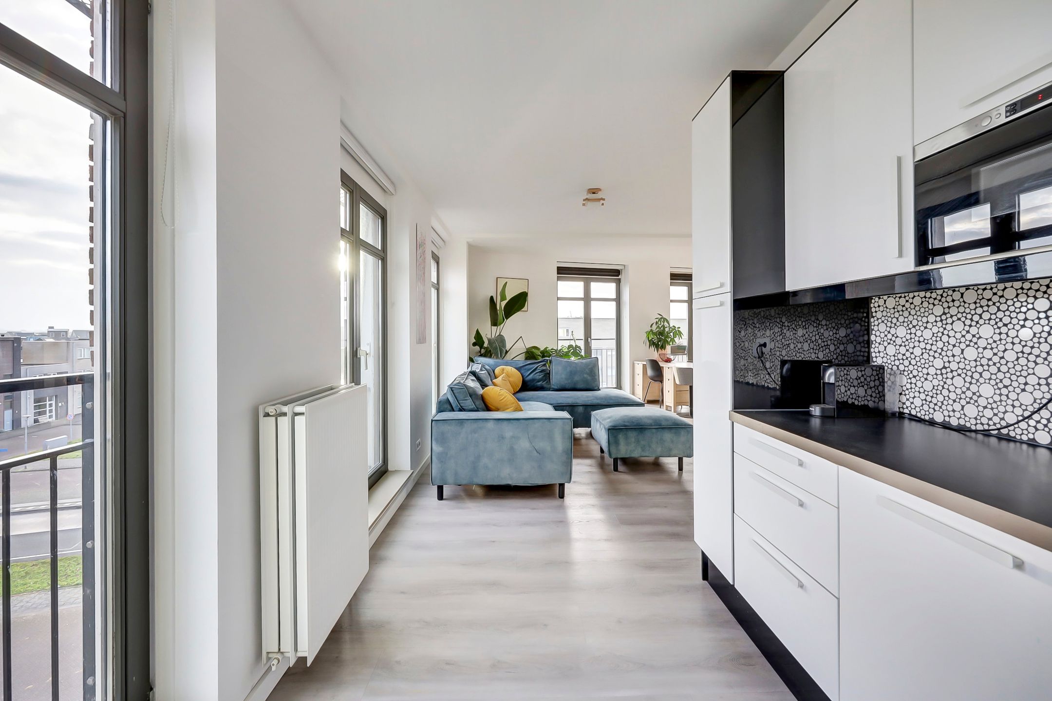 Spacious Penthouse with South-Facing Balcony and Canal Views in Almere Poort — 17