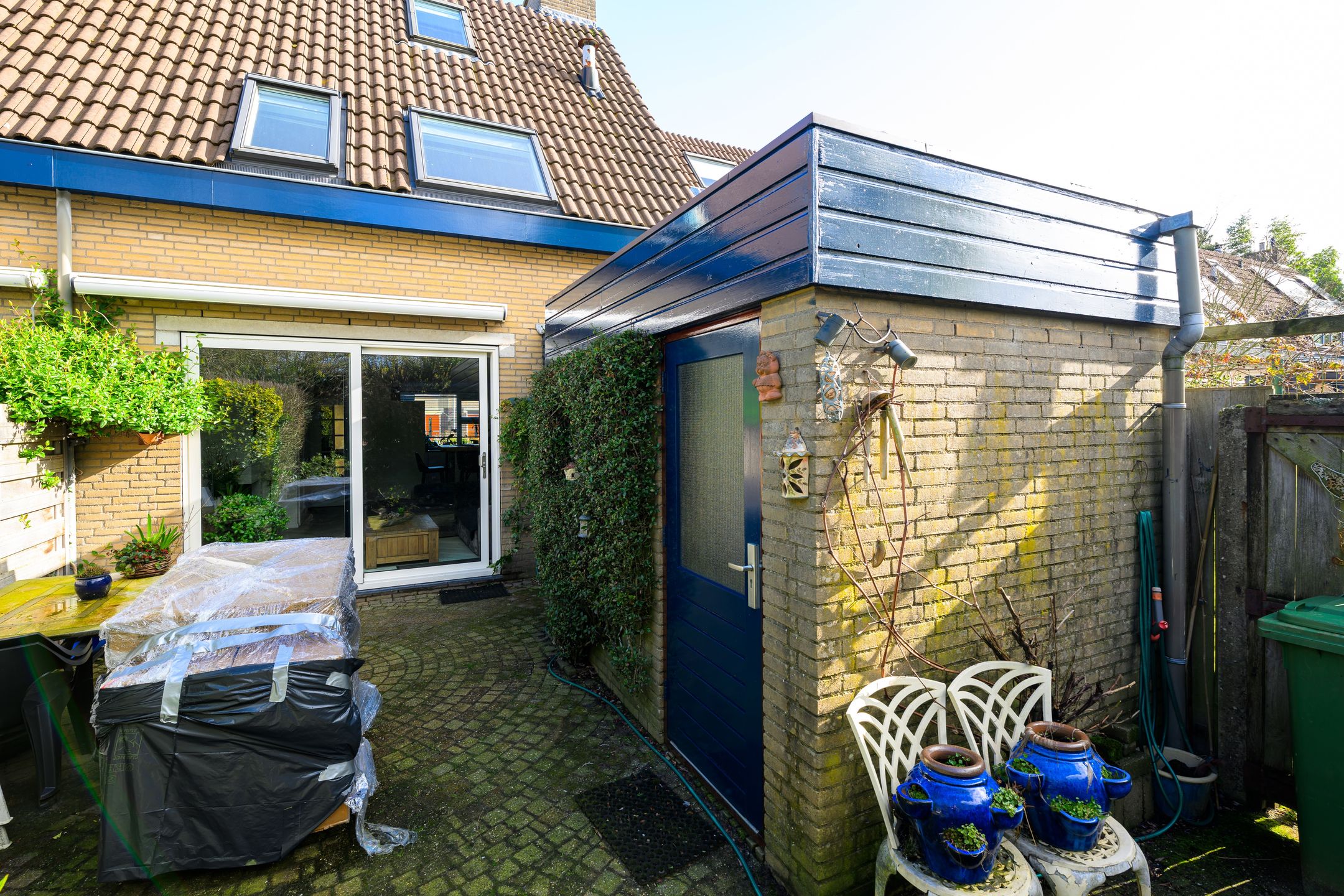 Modern corner home with wellness bathroom and sunny southeast backyard in Leidschendam — 12