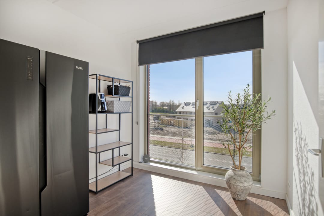 Virtually new energy-efficient terraced home with 2 living rooms in Dronten — 24