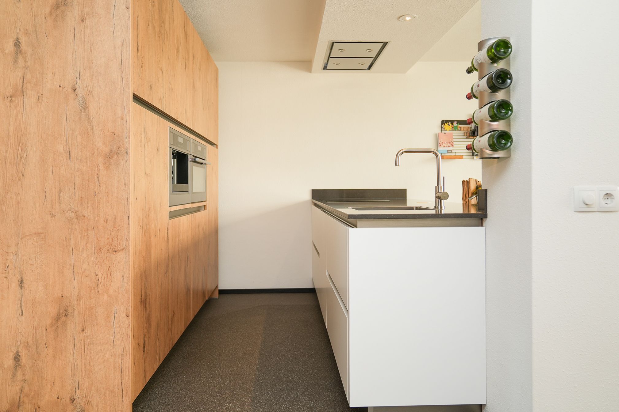 Eye-catching semi-detached house with 170 m² living space and deep south-facing backyard in prime village center location — 12