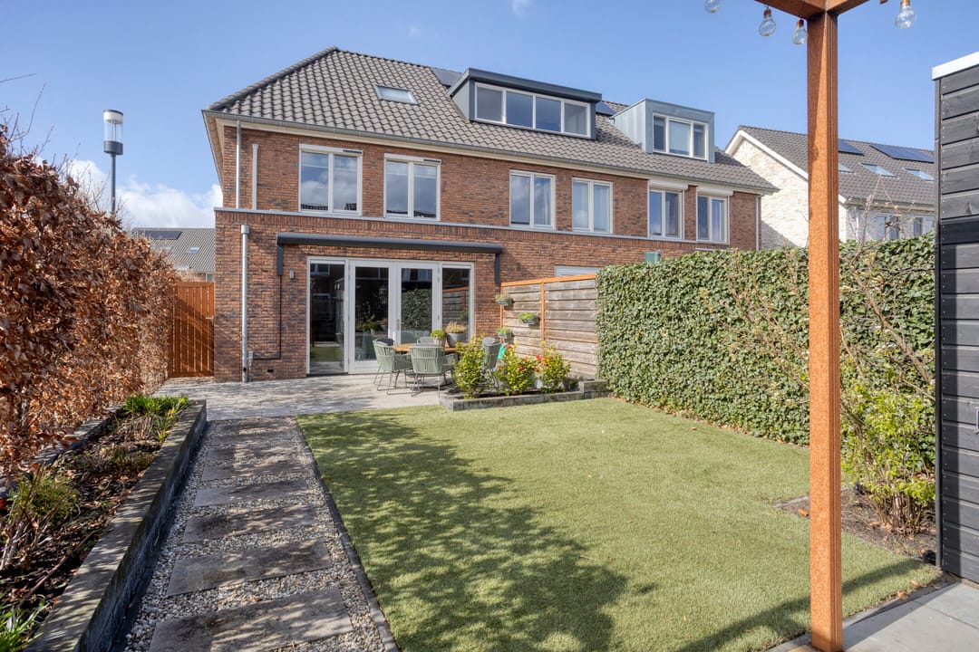 Modern corner home with extension and free view in Lent — 35