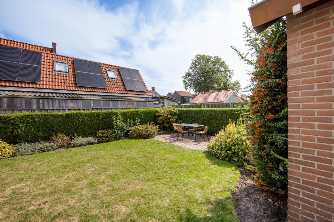 Spacious 1930s detached home with double garage and home practice potential — 20