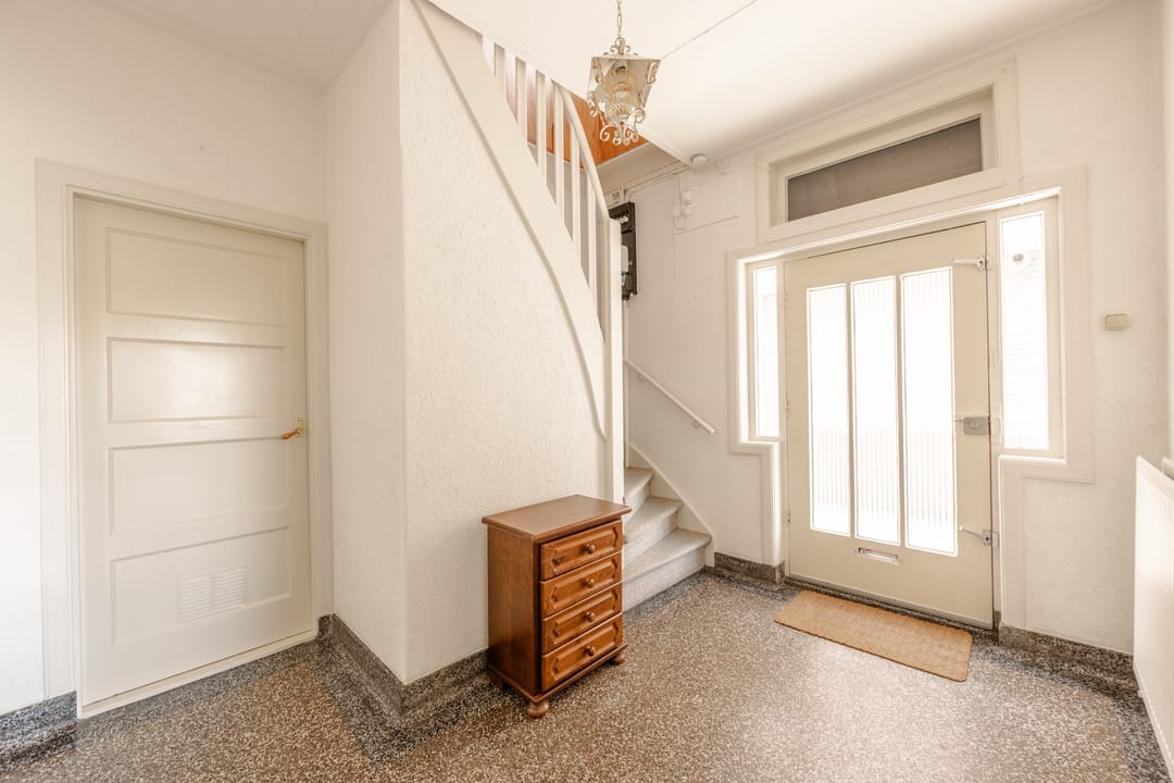 Spacious 1930s detached home with double garage and home practice potential — 25