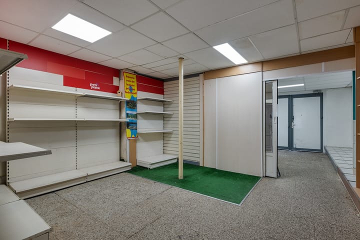 Tussenwoning te koop: Rogstraat 18, Grave
