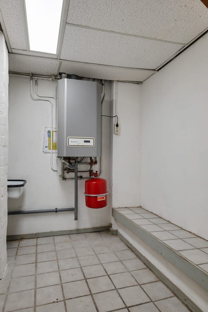 Tussenwoning te koop: Rogstraat 18, Grave