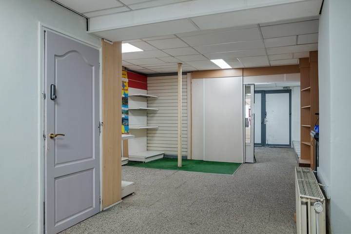 Tussenwoning te koop: Rogstraat 18, Grave