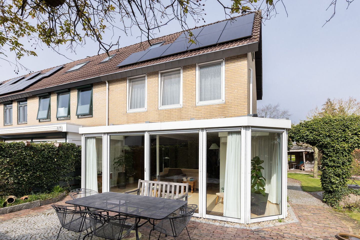 Spacious Corner Residence with Sunny Southeast Garden in Green Hofmaat Neighborhood — 34