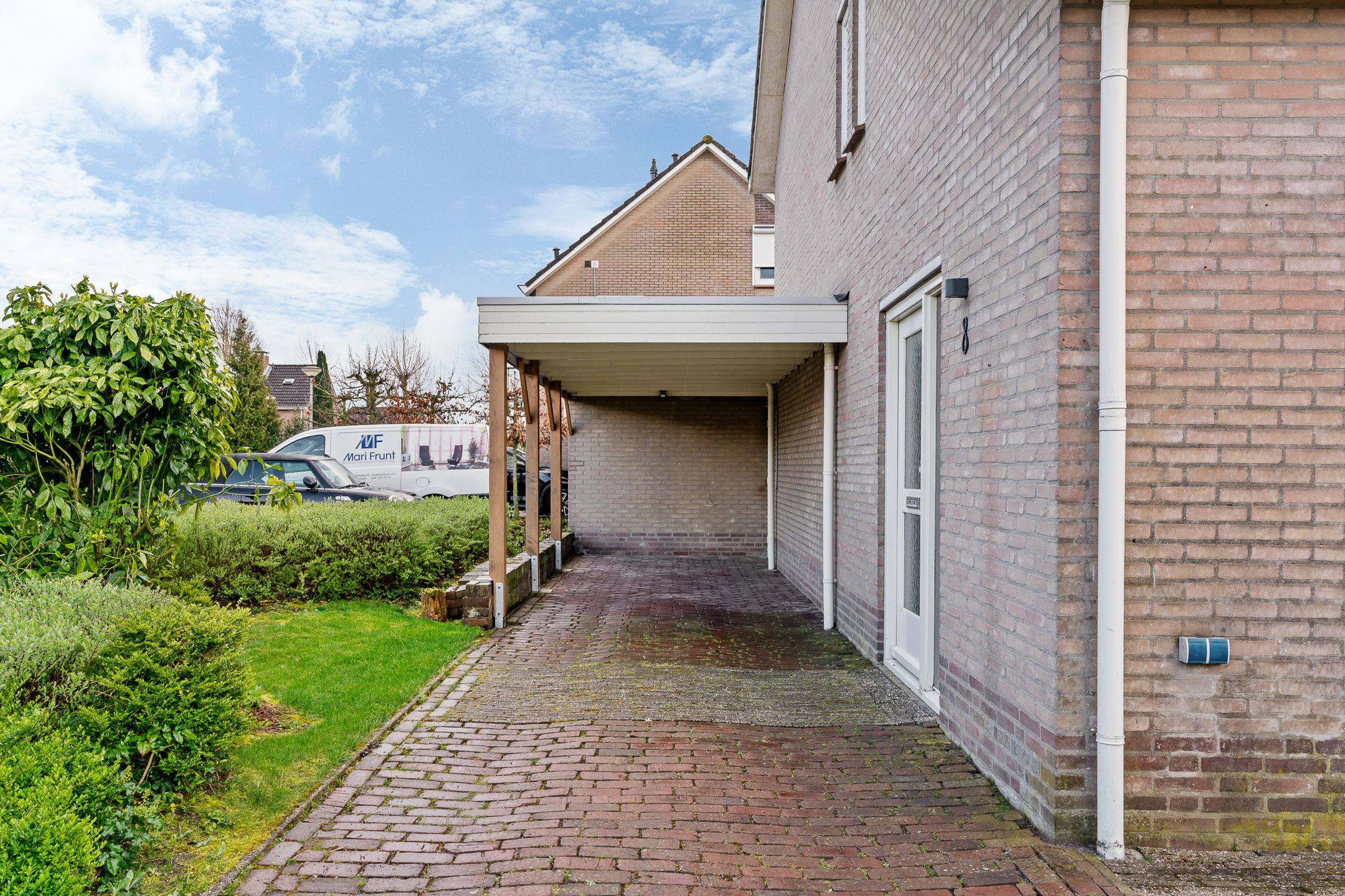 Modernized Semi-Detached Home with Veranda, Carport and Private Driveway in Quiet Location — 29