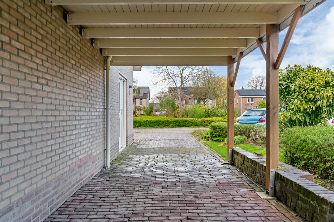 Modernized Semi-Detached Home with Veranda, Carport and Private Driveway in Quiet Location — 30